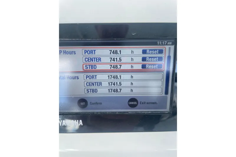 Slide: The Image of Display screen showing engine hours for a 2016 Contender 39 ST boat. - 10
