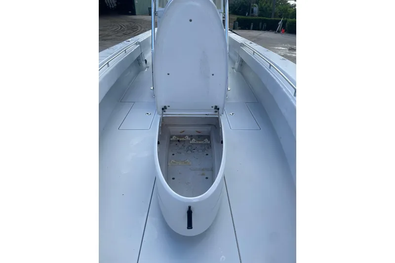 Slide: The Image of 2016 Contender 39 ST boat with open storage compartment on deck. - 12