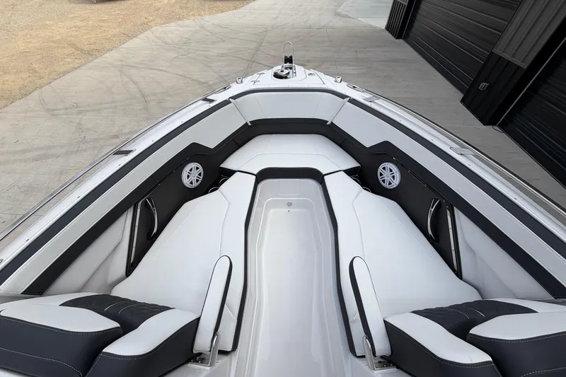 Slide: The Image of 2025 Monterey 278SS Super Sport boat interior with seating and storage compartments. - 14