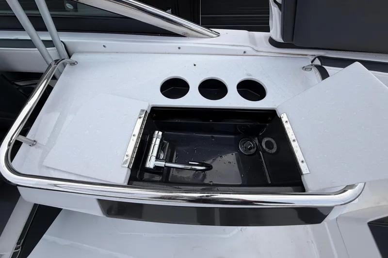 Slide: The Image of 2025 Monterey 278SS Super Sport boat interior with sleek white seating and modern design. - 15