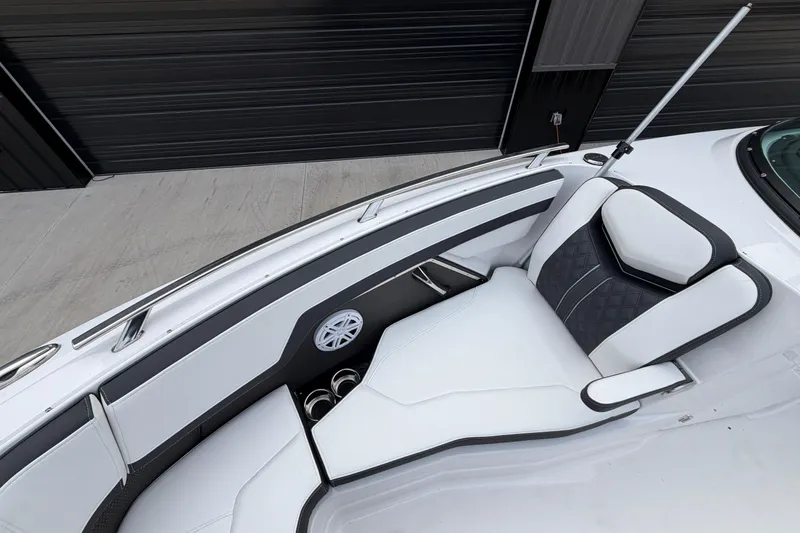 Slide: The Image of 2025 Monterey 278SS Super Sport boat sink with storage compartments and cup holders. - 16