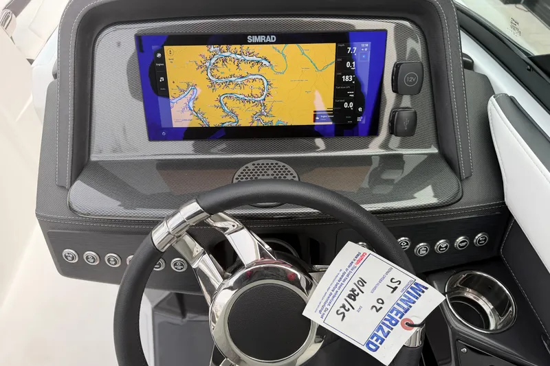 Slide: The Image of 2025 Monterey 278SS Super Sport boat cockpit with modern steering and navigation system. - 20
