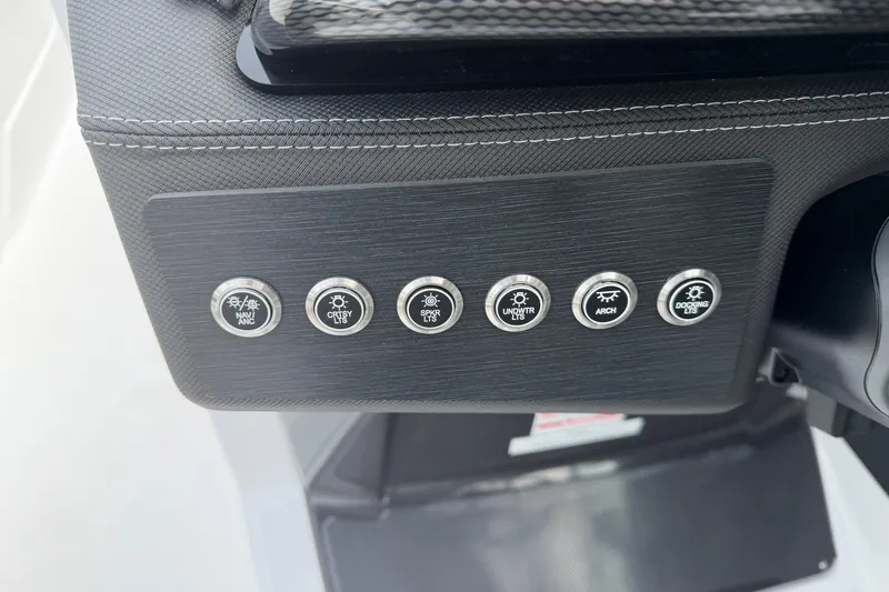 Slide: The Image of Control panel and warning labels on 2025 Monterey 278SS Super Sport boat. - 28