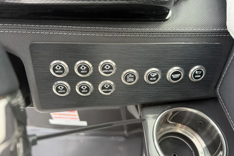 Slide: The Image of Dashboard controls of 2025 Monterey 278SS Super Sport boat, featuring various lighting options. - 29