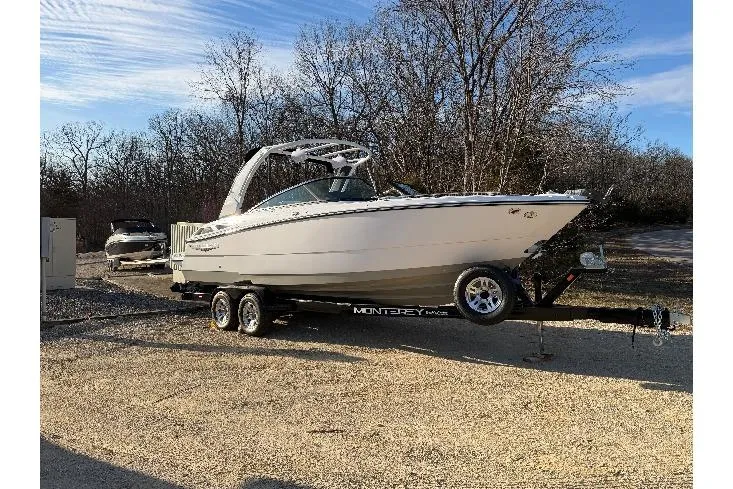 Slide: The Image of 2025 Monterey 278SS Super Sport boat on trailer under clear blue sky. - 3