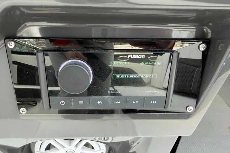 Slide: The Image of 2025 Monterey 278SS Super Sport boat interior with sleek black and white seating. - 31