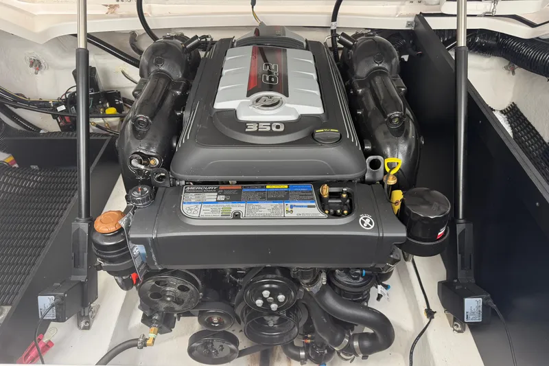 Slide: The Image of 2025 Monterey 278SS Super Sport boat stern with dual propellers on concrete surface. - 36