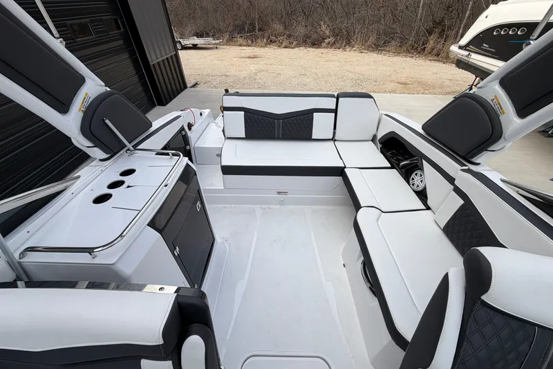 Slide: The Image of 2025 Monterey 278SS Super Sport boat interior with seating and control panel. - 8