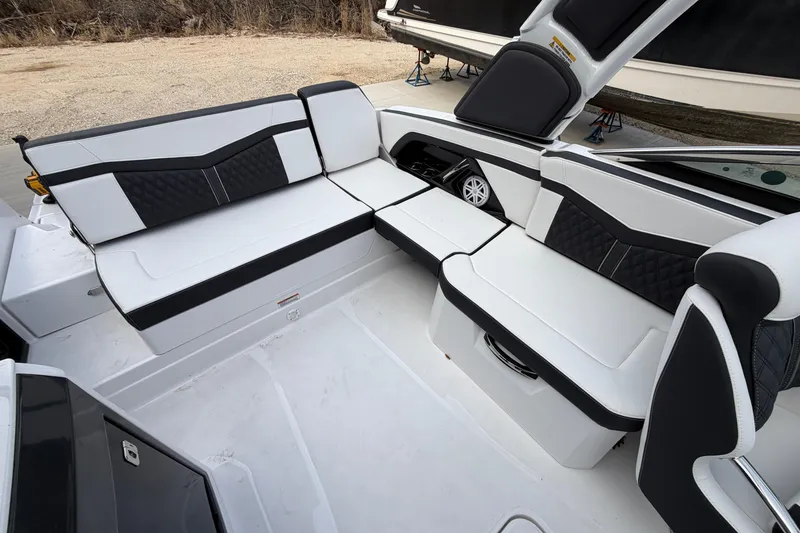Slide: The Image of 2025 Monterey 278SS Super Sport boat interior with sleek seating and modern design. - 9
