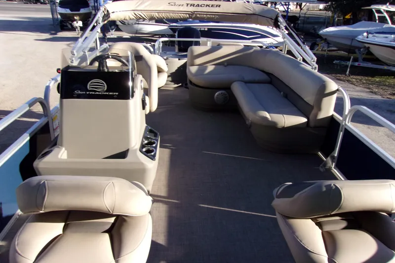 Slide: The Image of 2023 Sun Tracker Bass Buggy 18 DLX pontoon boat with spacious seating and modern design. - 5