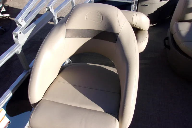 Slide: The Image of 2023 Sun Tracker Bass Buggy 18 DLX boat seat, beige upholstery, metal railing. - 7