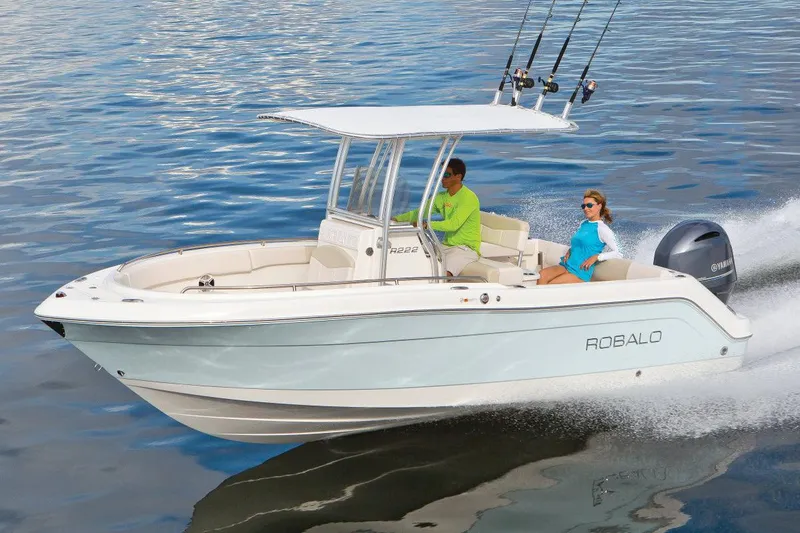 The Image of Manufacturer Provided Image: 2017 Robalo R222 Center Console boat cruising on water with two passengers. - 0