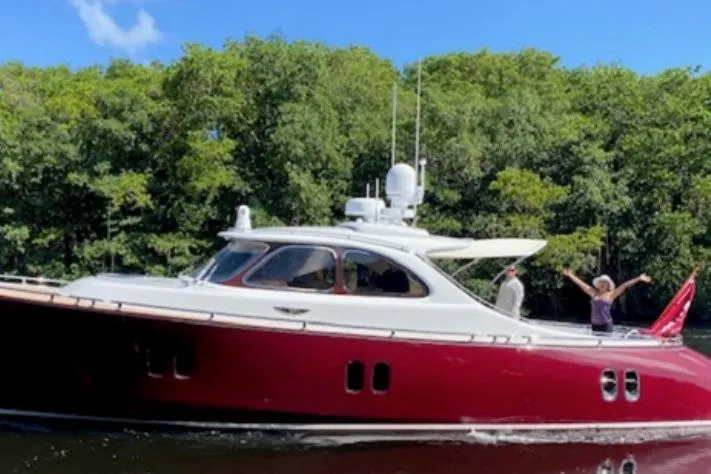 The Image of 2014 Zeelander Z44 yacht cruising on a sunny day with lush greenery in the background. - 0
