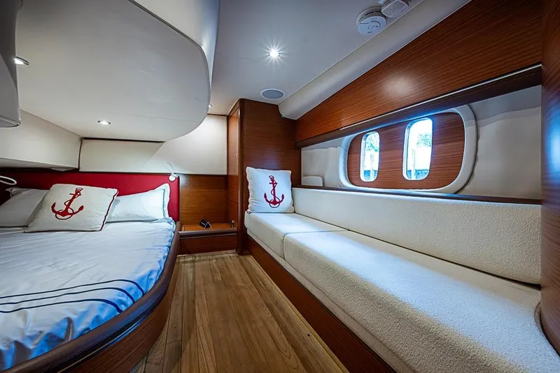 Slide: The Image of Luxurious 2014 Zeelander Z44 yacht cabin with elegant wood finish and nautical-themed decor. - 26