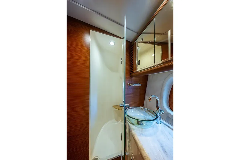 Slide: The Image of Luxurious bathroom interior of 2014 Zeelander Z44 yacht with glass sink and wooden accents. - 30