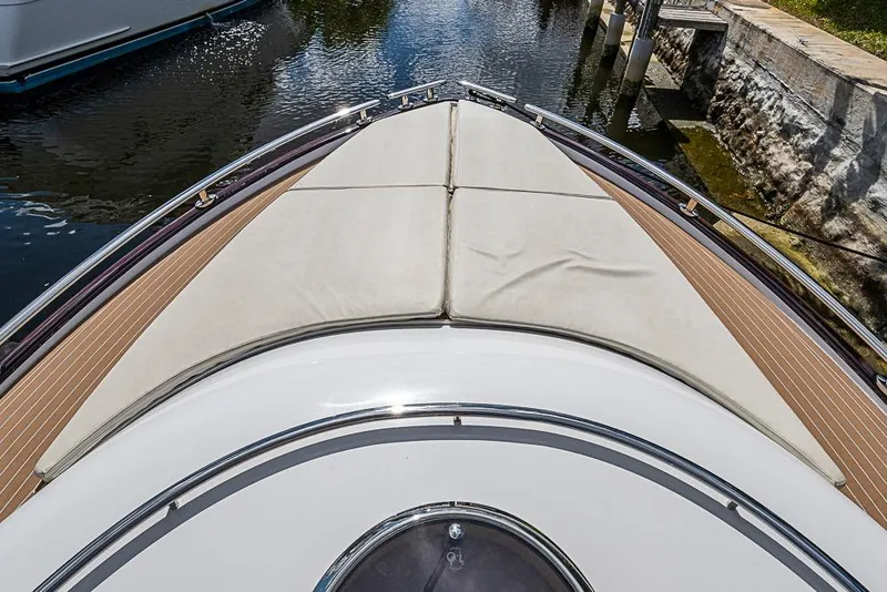 Slide: The Image of Bow view of 2014 Zeelander Z44 yacht with cushioned deck and sleek design. - 32