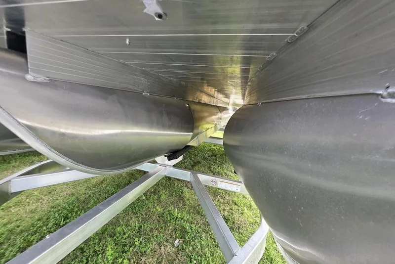 Slide: The Image of Underneath view of 2026 Veranda Vista Sport 22RC Tri-Toon, showcasing aluminum pontoons. - 10