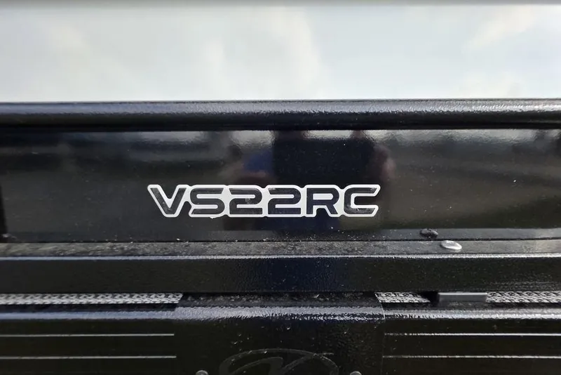Slide: The Image of Close-up of 2026 Veranda Vista Sport 22RC Tri-Toon model emblem. - 13
