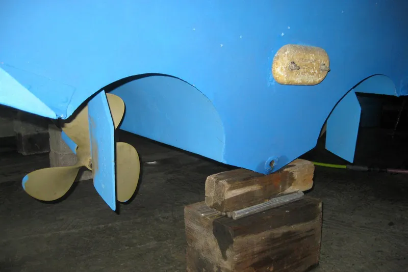 Slide: The Image of Interior of 1990 Sea Ray Sundancer 350 with cabinets, stereo, and nautical-themed lamps. - 26