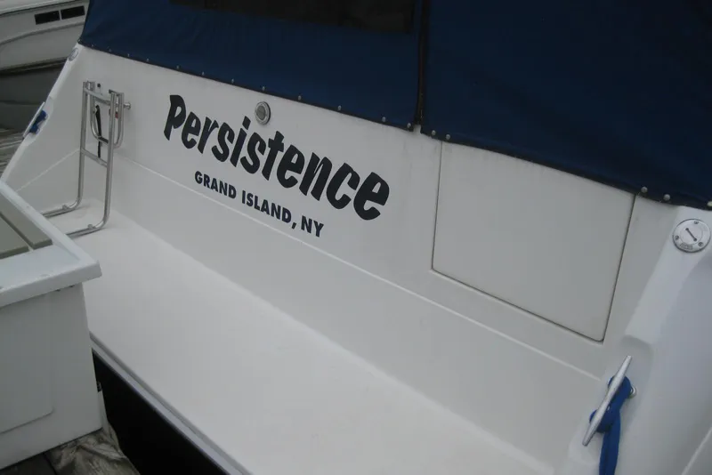 Slide: The Image of 1990 Sea Ray Sundancer 350 boat named "Persistence" docked at Grand Island, NY. - 7