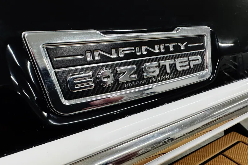 Slide: The Image of Infinity EZ Step badge on 2026 Chaparral SSX 4, patent pending design. - 10