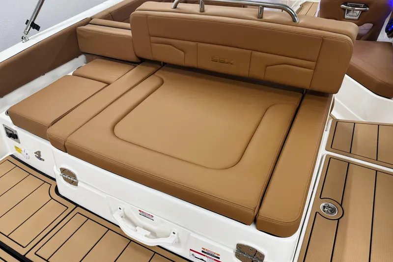 Slide: The Image of 2026 Chaparral SSX 4 boat interior with tan leather seating and sleek design. - 15