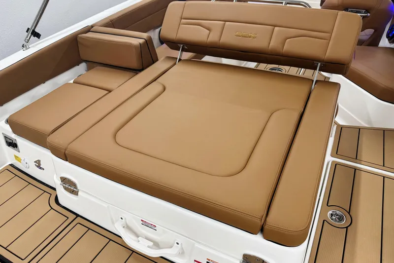 Slide: The Image of 2026 Chaparral SSX 4 boat interior with luxurious tan leather seating. - 16