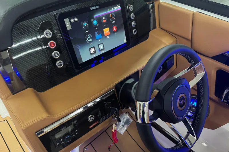 Slide: The Image of 2026 Chaparral SSX 4 dashboard with touchscreen display and modern steering wheel. - 33