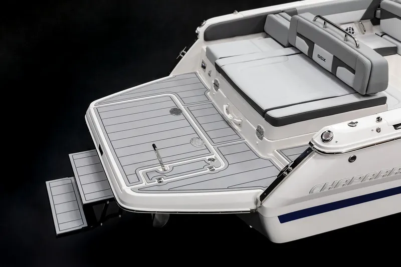 Slide: The Image of 2026 Chaparral SSX 4 boat in garage, featuring sleek design and luxurious seating. - 6