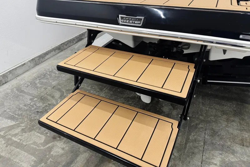 Slide: The Image of 2026 Chaparral SSX 4 boat swim platform with tan non-slip steps. - 9