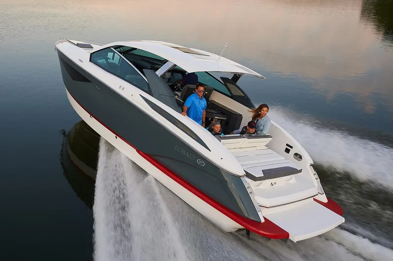 Slide: The Image of Manufacturer Provided Image: 2020 Cobalt A36 boat cruising on water with passengers. - 5