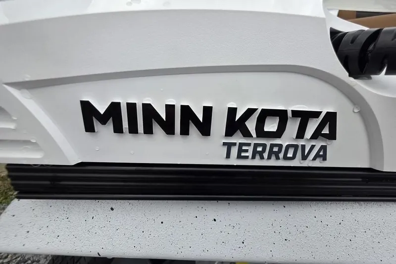 Slide: The Image of Close-up of Minn Kota Terrova logo on 2026 Xpress H20B Bay boat. - 18