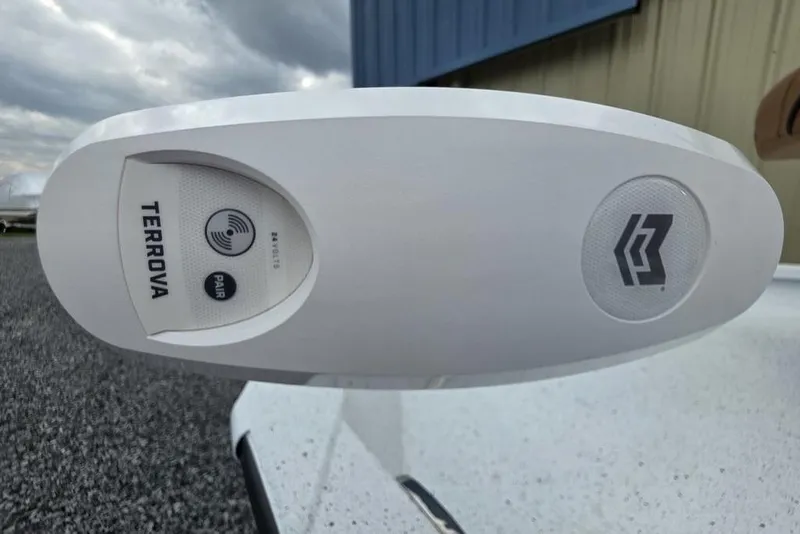 Slide: The Image of 2026 Xpress H20B Bay boat with Terrova trolling motor, close-up view. - 25