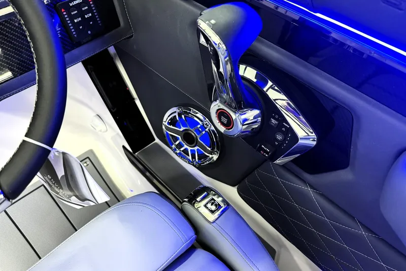 Slide: The Image of Interior of 2026 Chaparral SSX 6 boat with modern controls and sleek design. - 17
