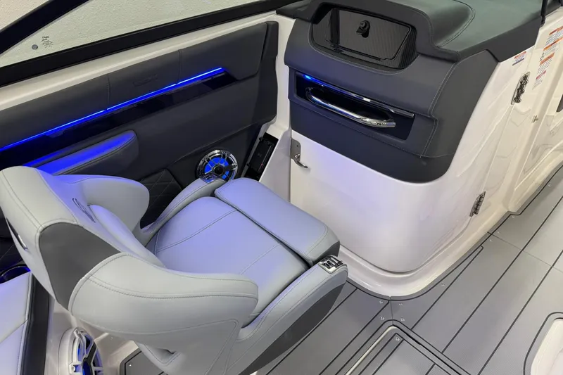Slide: The Image of 2026 Chaparral SSX 6 boat interior with sleek seating and modern design elements. - 20