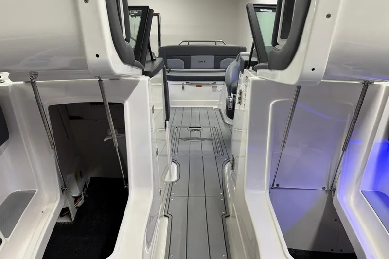 Slide: The Image of 2026 Chaparral SSX 6 boat interior with sleek design and modern seating. - 39