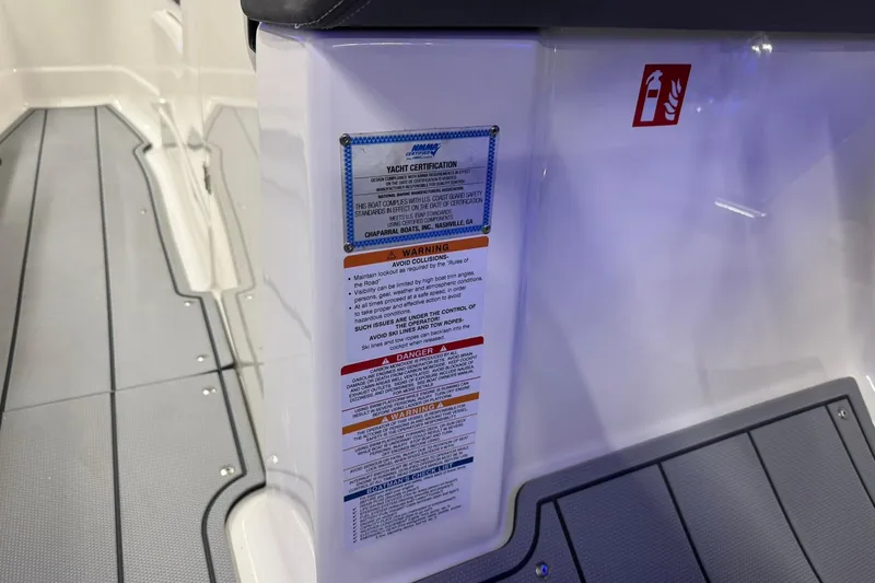 Slide: The Image of 2026 Chaparral SSX 6 yacht certification and safety warnings on deck. - 32