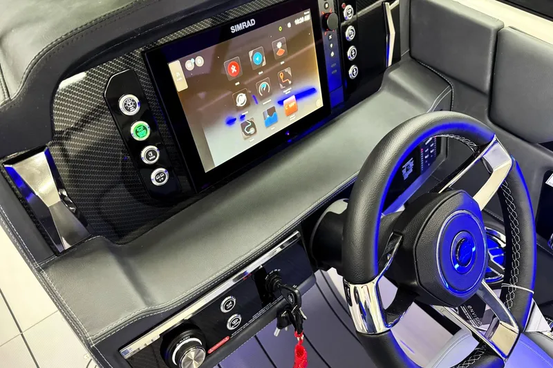 Slide: The Image of 2026 Chaparral SSX 6 dashboard with touchscreen display and modern steering wheel. - 15