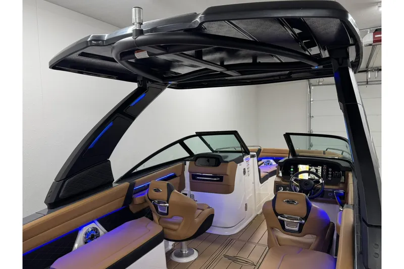Slide: The Image of Interior of 2026 Chaparral SSX 6 boat with modern seating and dashboard. - 16