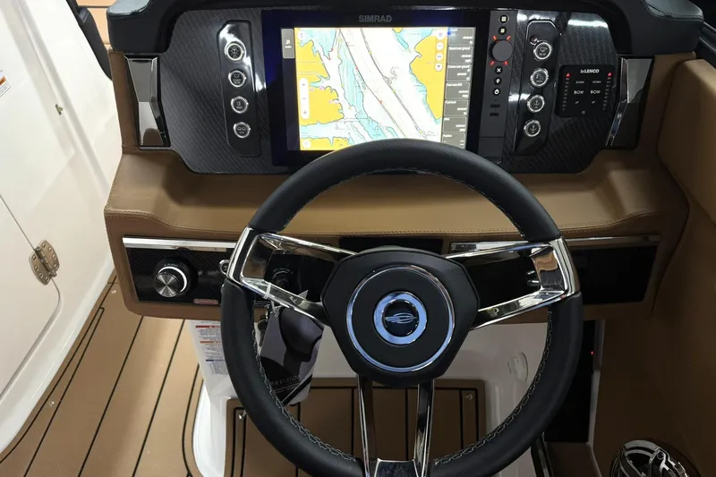 Slide: The Image of 2026 Chaparral SSX 6 dashboard with steering wheel and navigation display. - 25