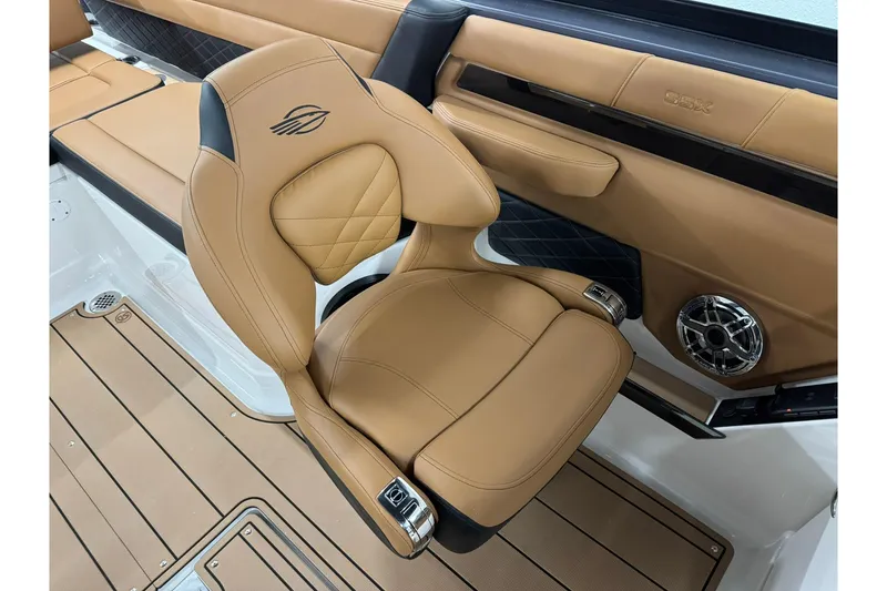 Slide: The Image of Luxurious tan seating in 2026 Chaparral SSX 6 boat interior, featuring sleek design and premium materials. - 29