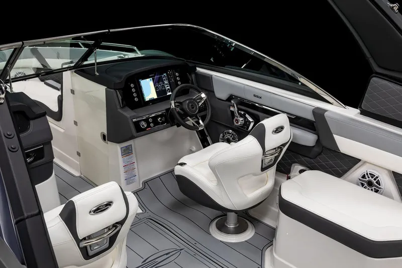 Slide: The Image of Manufacturer Provided Image: Manufacturer Provided Image: 2025 Chaparral 267 SSX boat interior with modern dashboard and seating. - 4