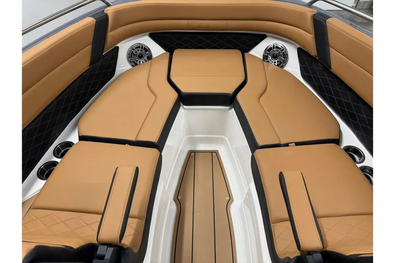Slide: The Image of Luxurious interior of 2026 Chaparral SSX 6 boat with tan leather seating and modern design. - 40