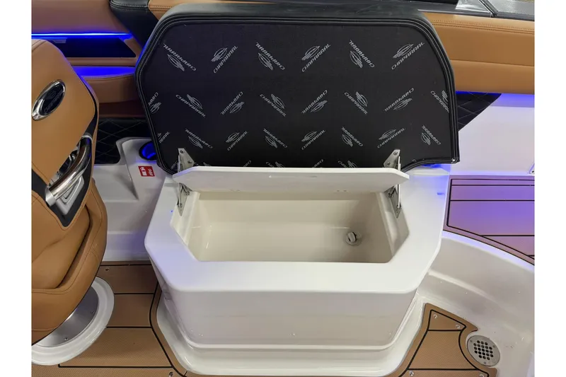 Slide: The Image of Open storage compartment on 2026 Chaparral SSX 6 boat, featuring sleek interior design. - 51