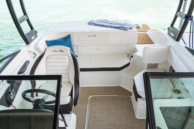 Slide: The Image of Manufacturer Provided Image: 2020 Sea Ray SPX 190 boat interior with seating and steering wheel. - 10