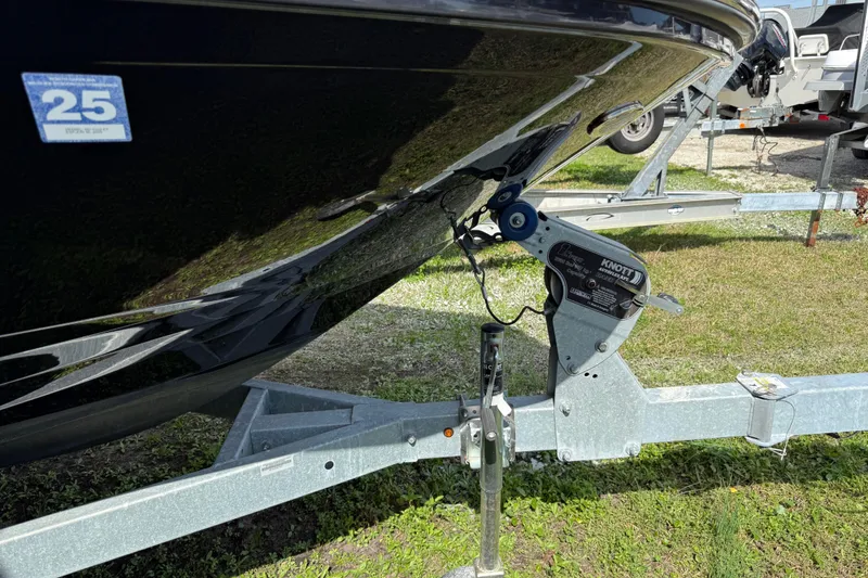 Slide: The Image of 2021 Sea Ray 19 SPX OB boat on trailer, close-up of hull and winch. - 26