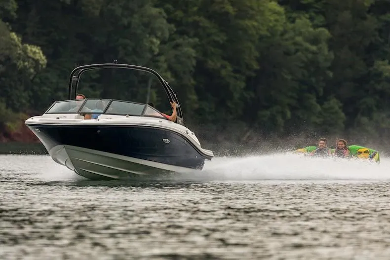 Slide: The Image of Manufacturer Provided Image: 2020 Sea Ray SPX 190 boat towing people on a lake. - 4