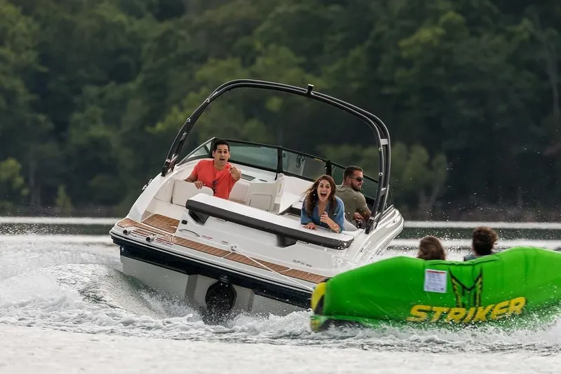 Slide: The Image of Manufacturer Provided Image: 2020 Sea Ray SPX 190 boat towing inflatable tube on a lake. - 5