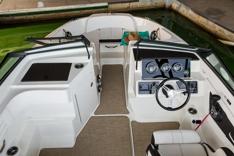 Slide: The Image of Manufacturer Provided Image: 2020 Sea Ray SPX 190 boat interior with dashboard and seating. - 7
