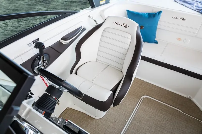 Slide: The Image of Manufacturer Provided Image: 2020 Sea Ray SPX 190 boat interior with captain's chair and steering wheel. - 9